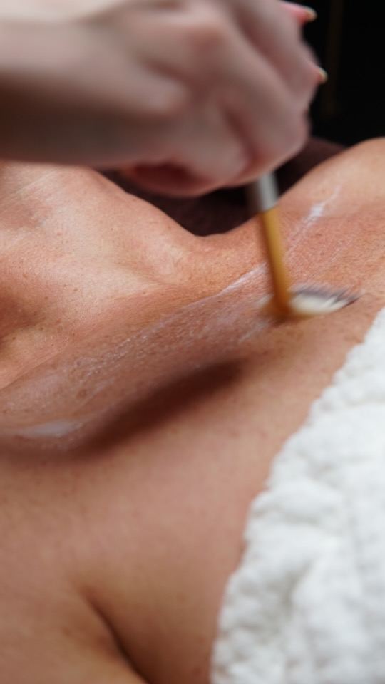 Skincare treatment brush application