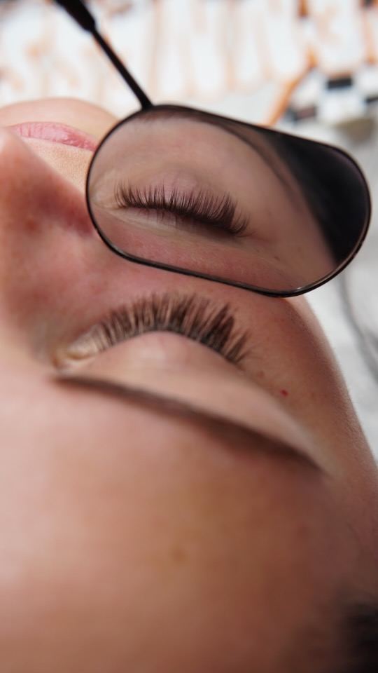 Lash extension mirror reflection close up